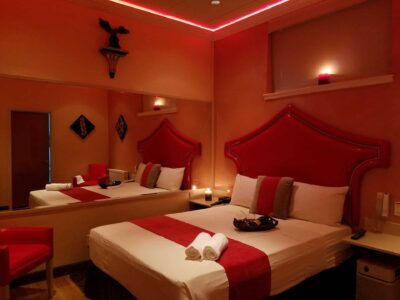 Red accented romantic hotel room in NYC